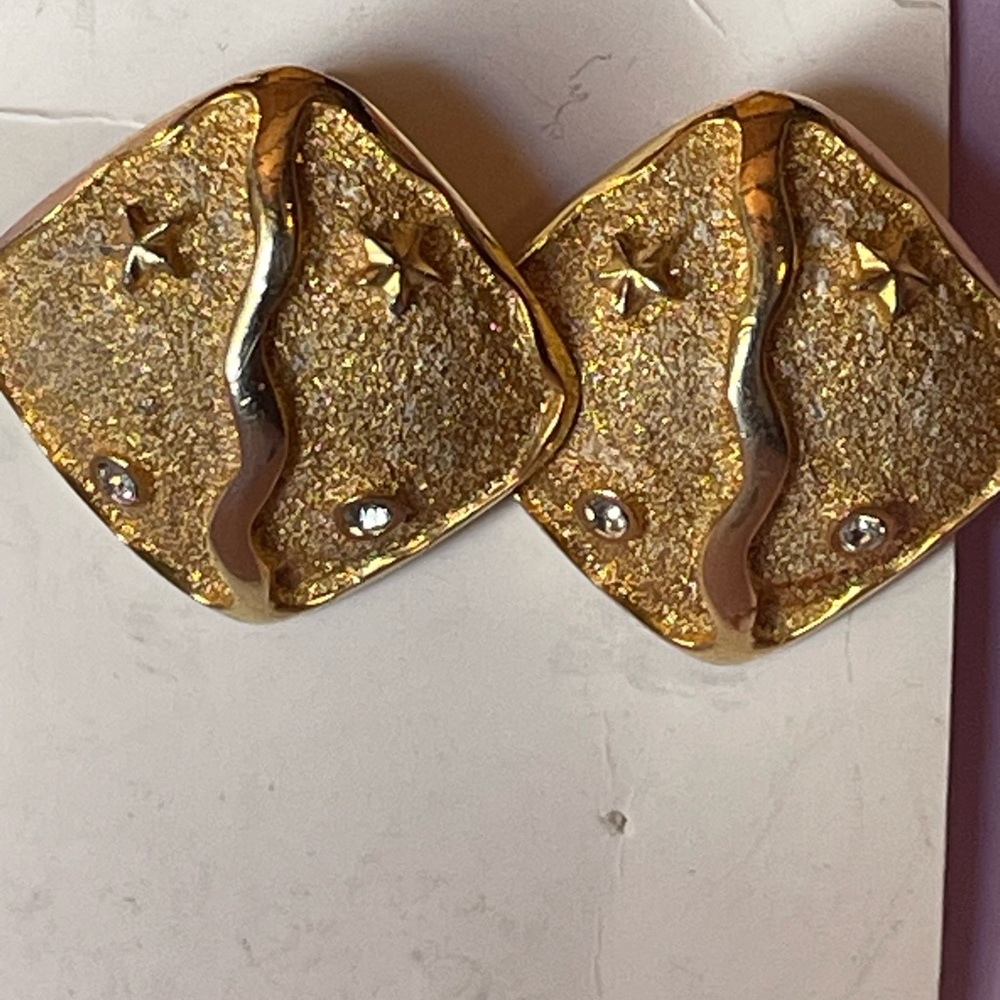 Gold Textured Star Accent Clip-On Earrings